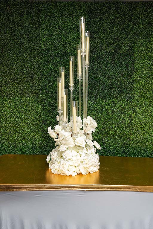Clear-Spiral-Cluster-Candelabra-with-floral-wreath-Centerpiece-Amore-Decor-Rental-50