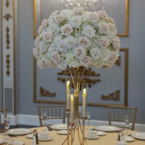 White Hydrangea with White and Beige Roses on Gold Hourglass Stand with Gold Taper Candle Holders