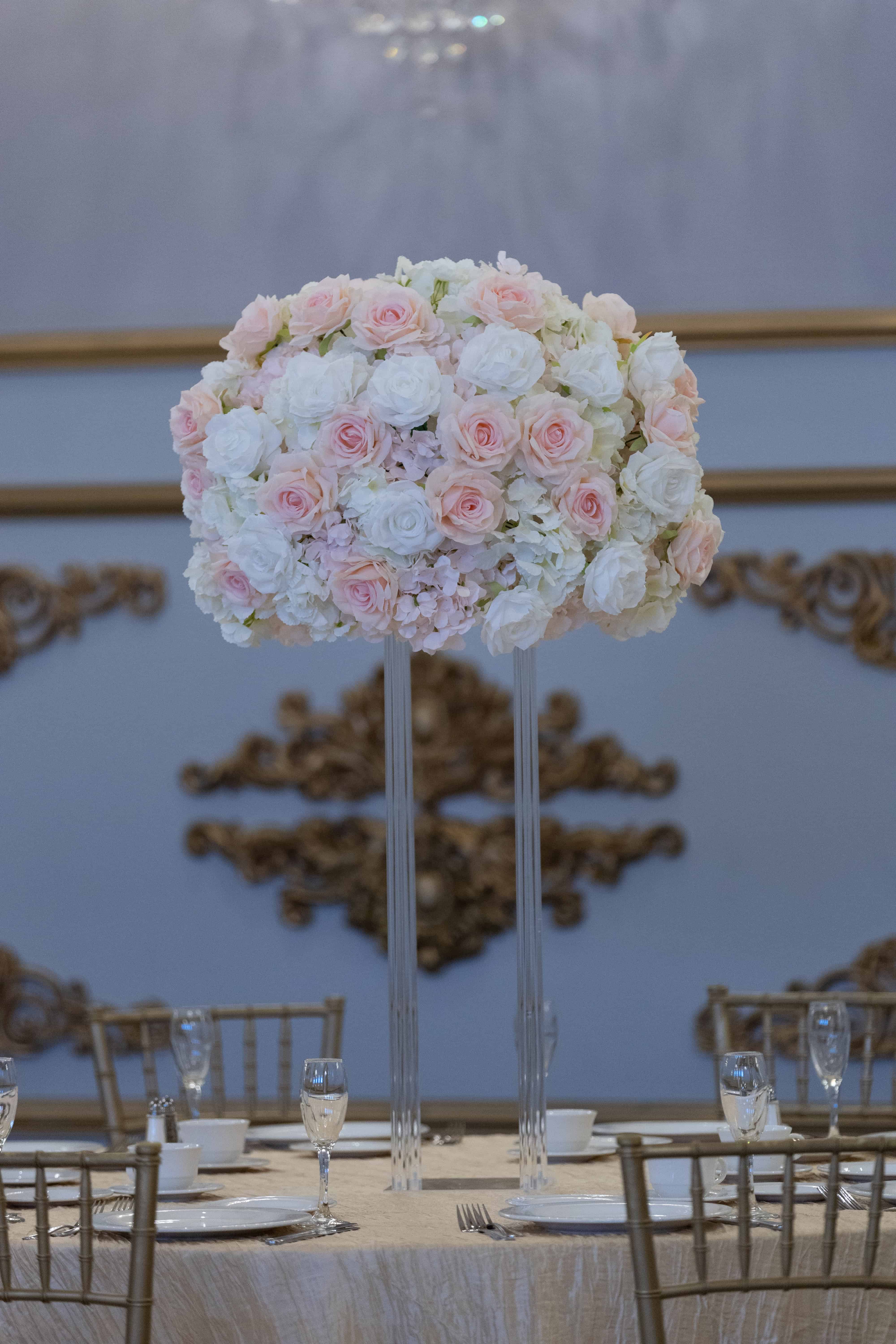 White Hydrangea with white and blush roses on Clear Harlow Stand