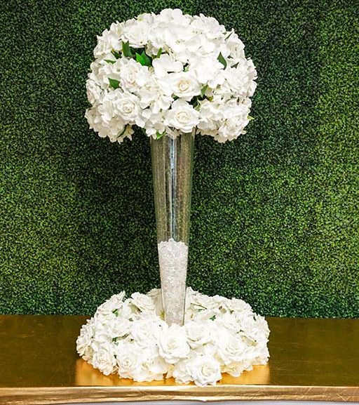 Hydrangea-and-rose-with-greenery-on-Pilsner-vase-with-floral-wreath-and-clear-gems-Centerpiece-Amore-Decor-Rental-126