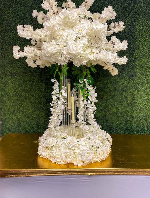 Timeless-centerpiece-on-clear-acrylic-stand-with-hanging-floral-and-floral-wreath-Centerpiece-Amore-Decor-Rental-95